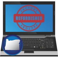 oregon map icon and a refurbished laptop computer